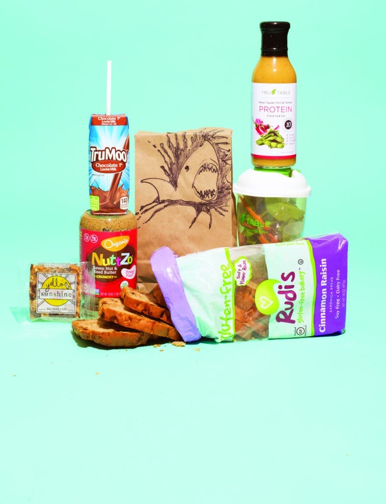 Photo Editor Scott Draper draws awesome shark designs on his son Lucas' lunch bags!