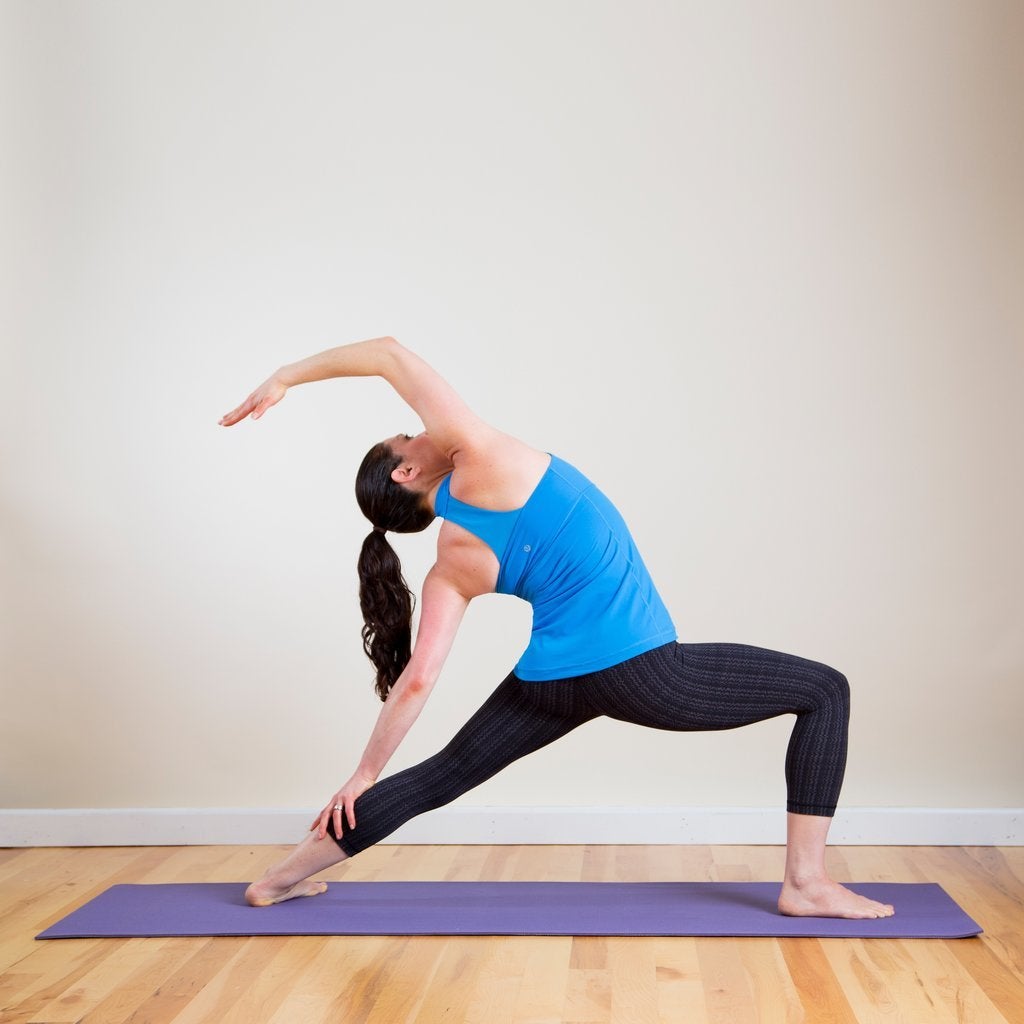 Try the relaxing happy baby yoga pose to stretch your back