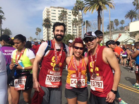 Jonathan Russin, MD, finished his first marathon with former patient Kathy Nguyen and her husband, Robby.