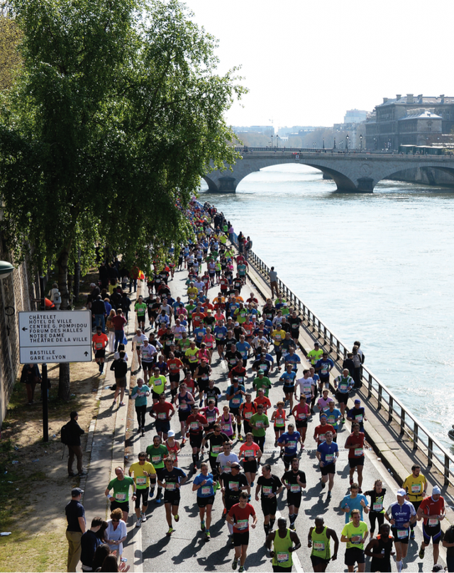 A Behind-The-Scenes Look At What It Is Like To Run The Paris Marathon