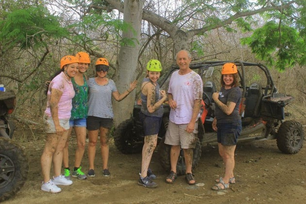I'm center (yellow helmet) showing off my mud!