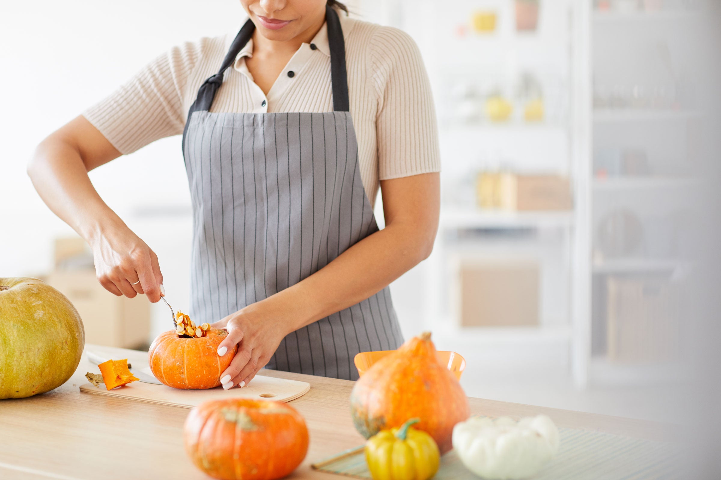 woman-preparing-to-cook-pumpkin