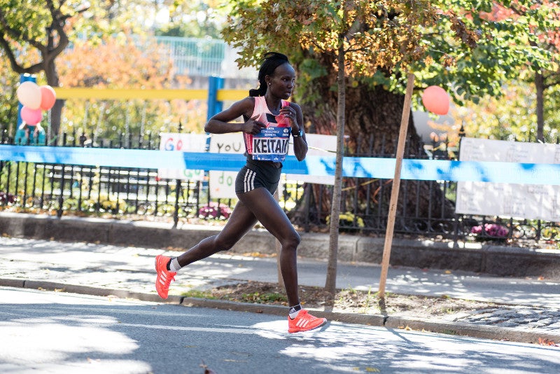 Mary Keitany racing toward her third consecutive win at the New York City Marathon in 2016. Photo courtesy of New York Road Runners.