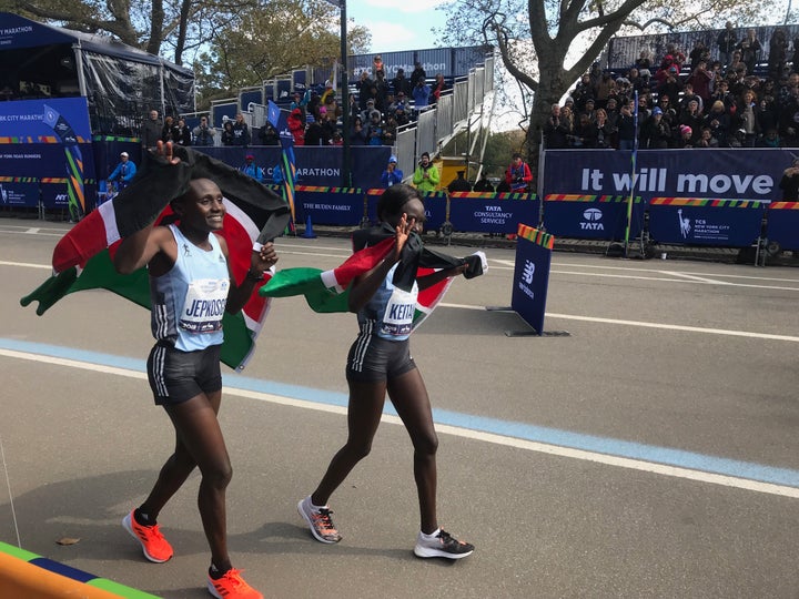 Joyciline Jepkosgei and Mary Keitany celebrate their first and second place finishes at the 2019 New York City Marathon.