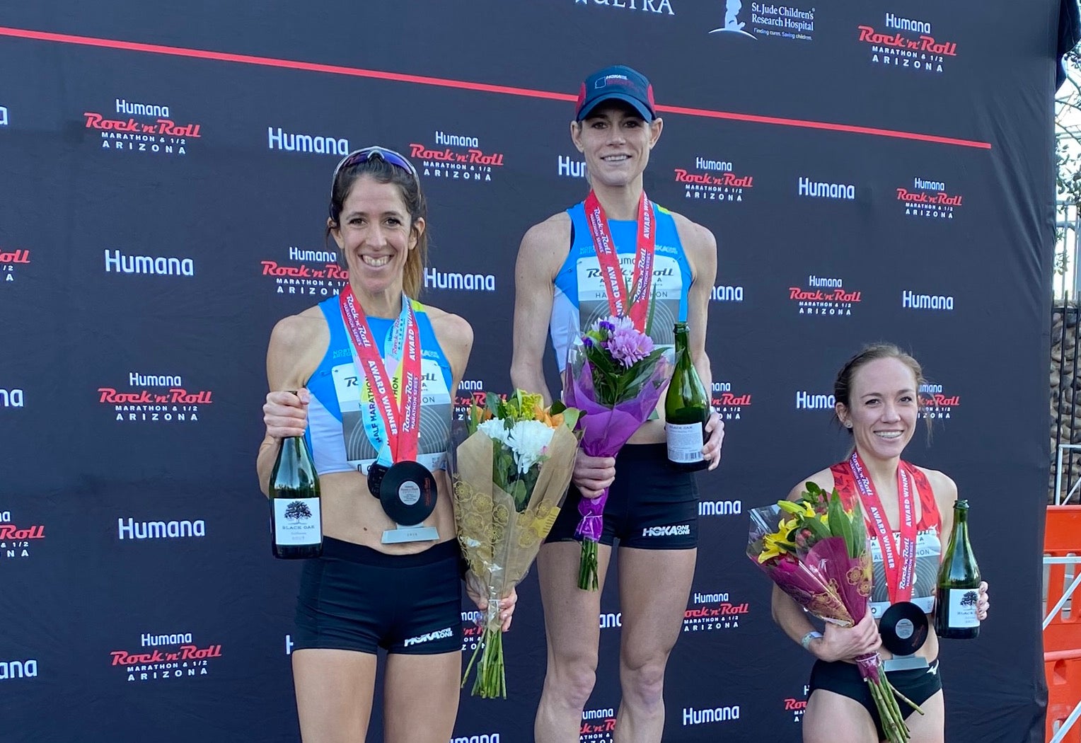 PHOTO: Carrie Cox Stephanie Bruce, Kellyn Taylor, and Bridget Belyeu are the top three finishers at 2020 Rock 'n' Roll Arizona Half Marathon while preparing for the Olympic Trials.