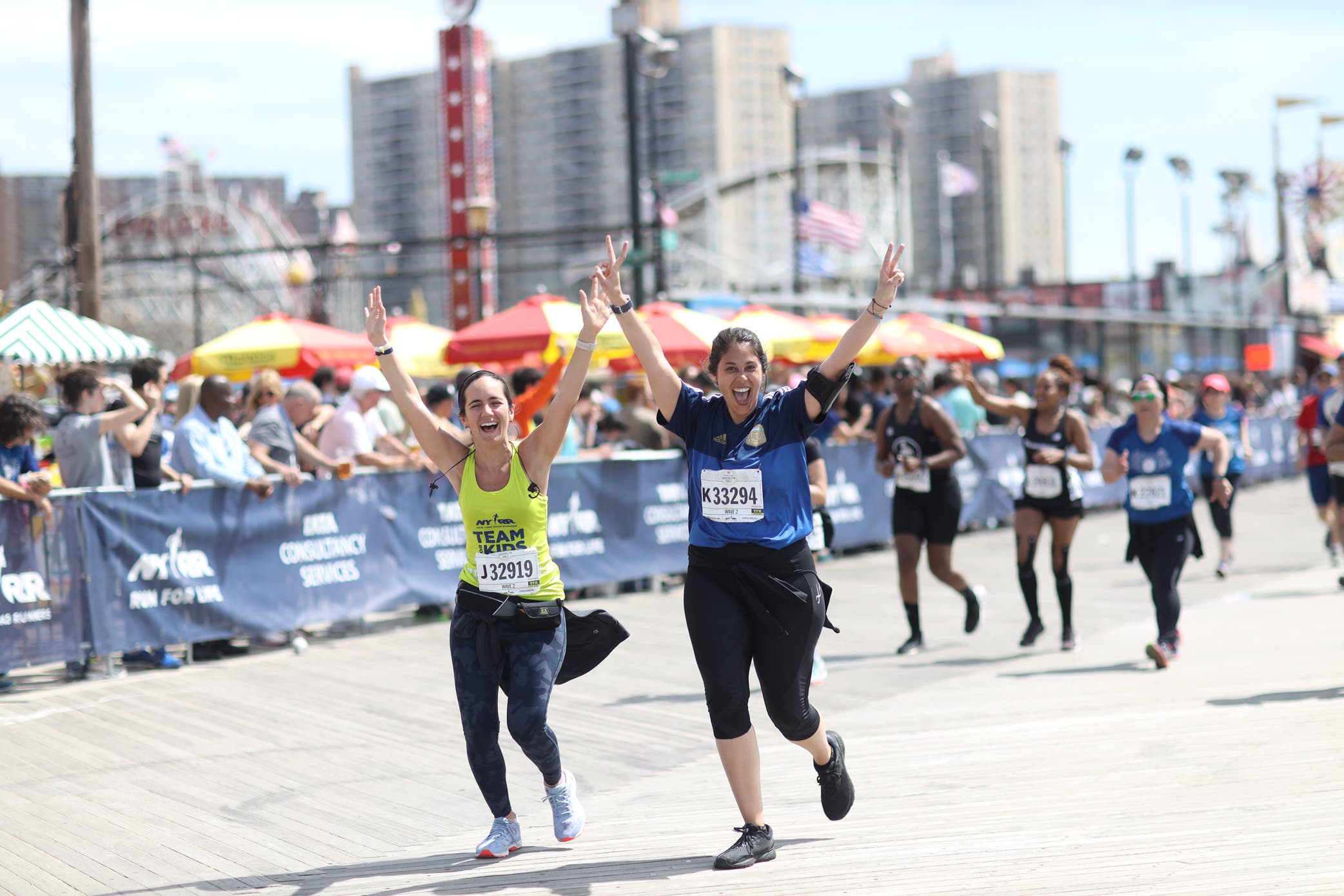 two friends running a half marathon together