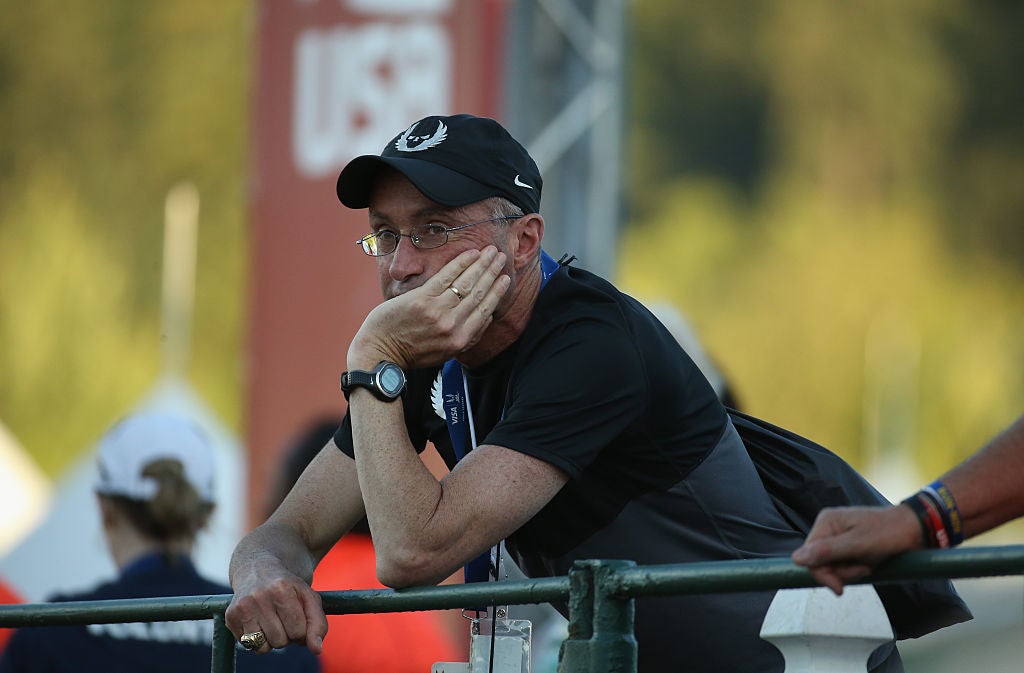 PHOTO: Andy Lyons/Getty Images Alberto Salazar former coach of the Nike Oregon Project watches the Mens 10,000 meters during day one of the 2015 USA Outdoor Track &amp; Field Championships at Hayward Field on June 25, 2015 in Eugene, Oregon. Salazar is currently serving a four-year ban from USADA and a temporary suspension from the U.S. Center for SafeSport.