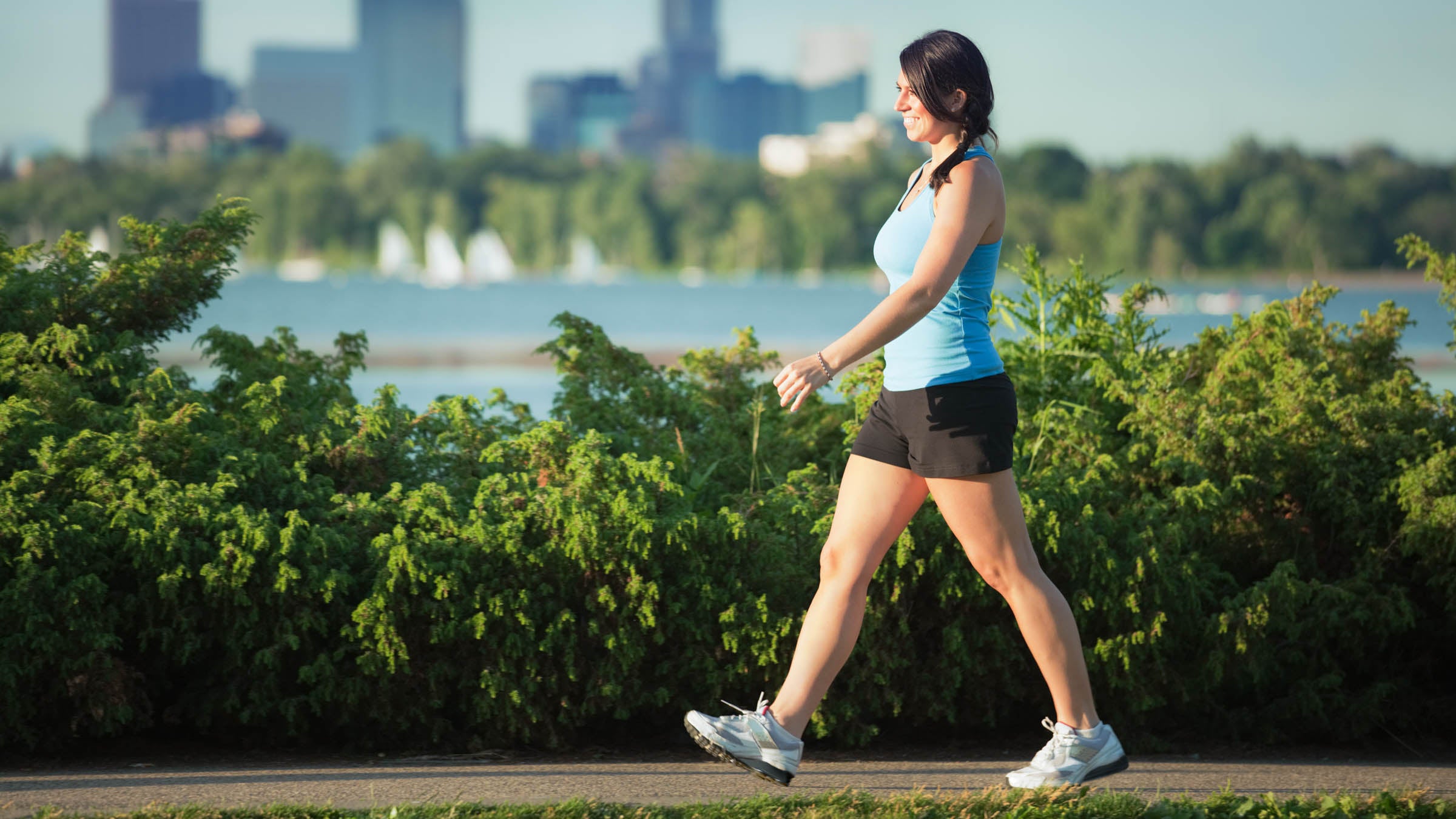 Woman taking walk on waterfront