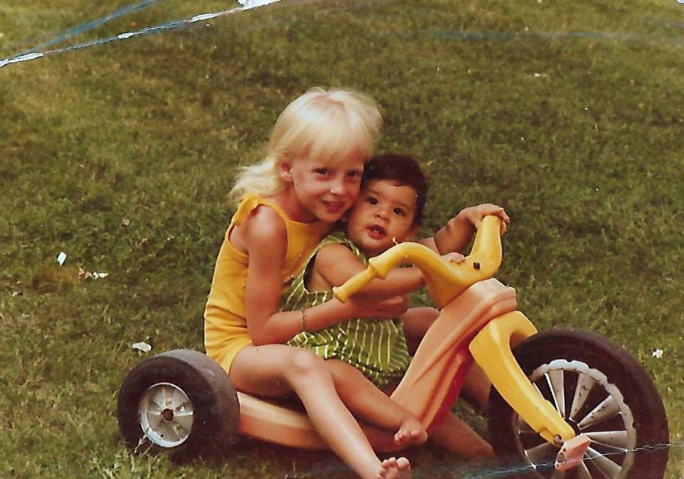 Deena Kastor with her younger sister as a kid