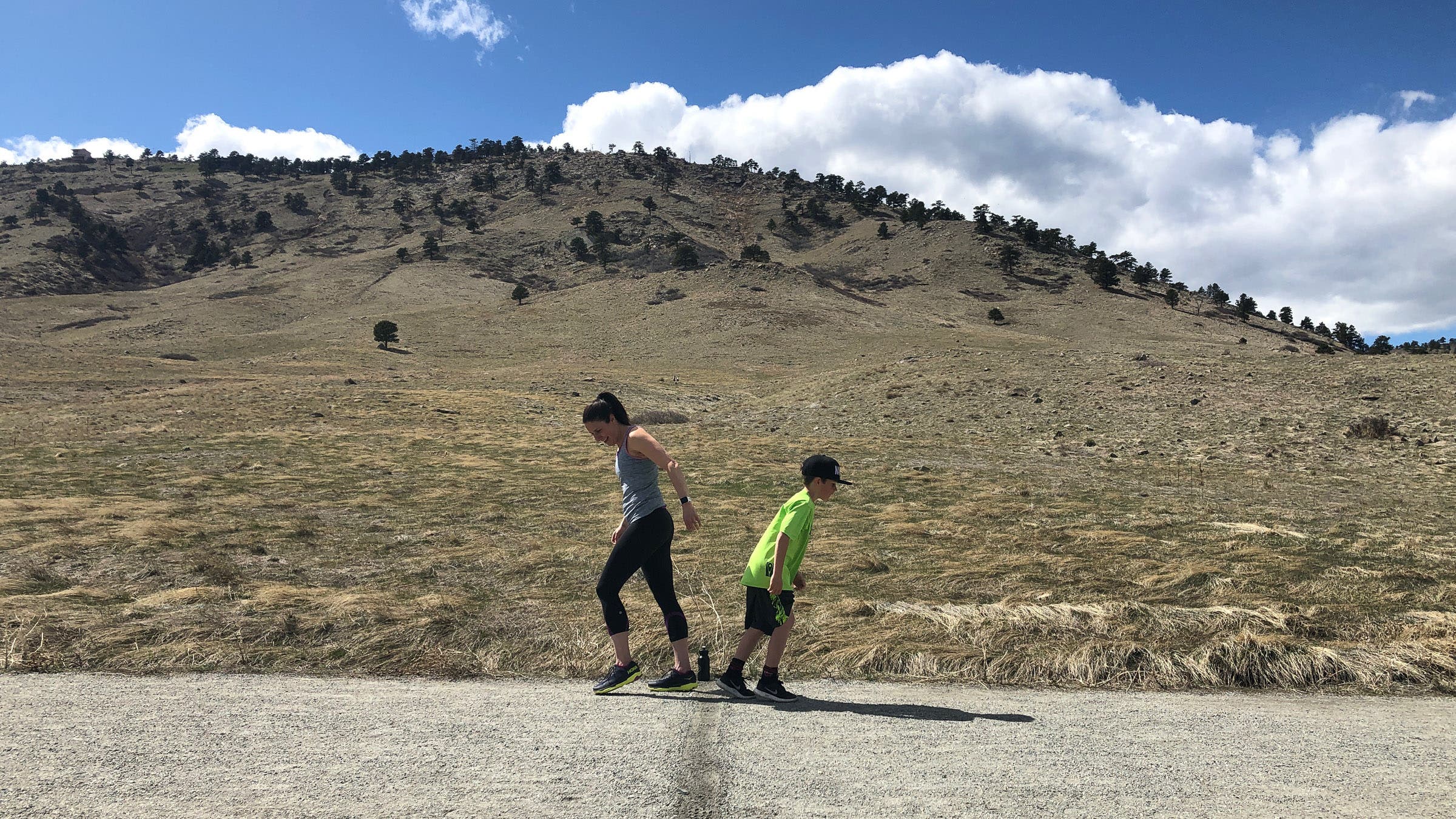 Mother and son race on trail