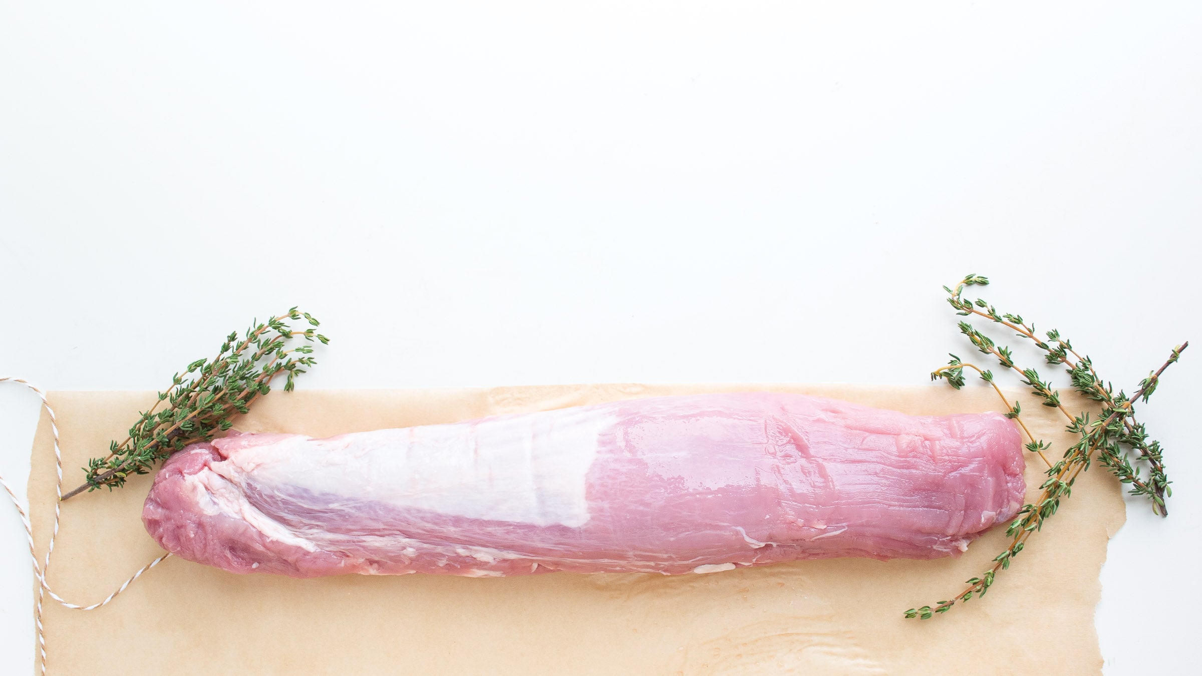 Pork tenderloin on white background