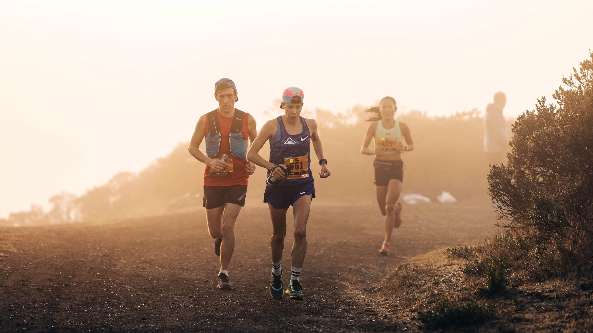 Addie runs an ultramarathon on a hazy sunny day