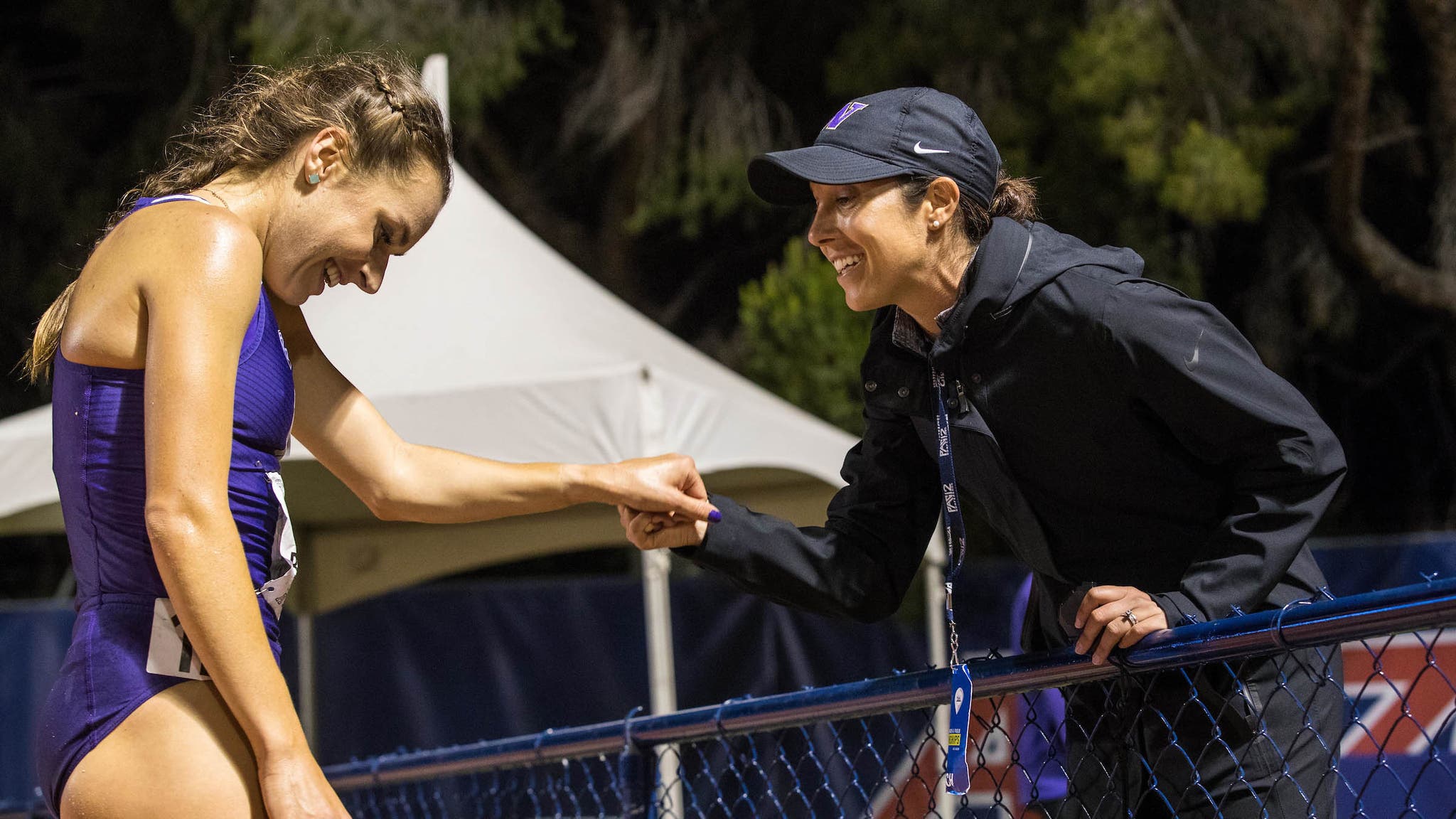 Coach Maurica Powell congratulates Izzi Batt-Doyle