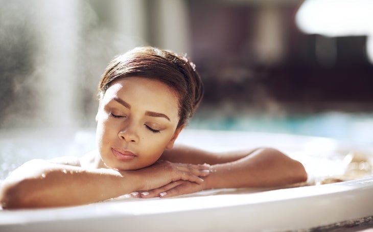 Soaking in a hot tub is a great way to recover after a workout.