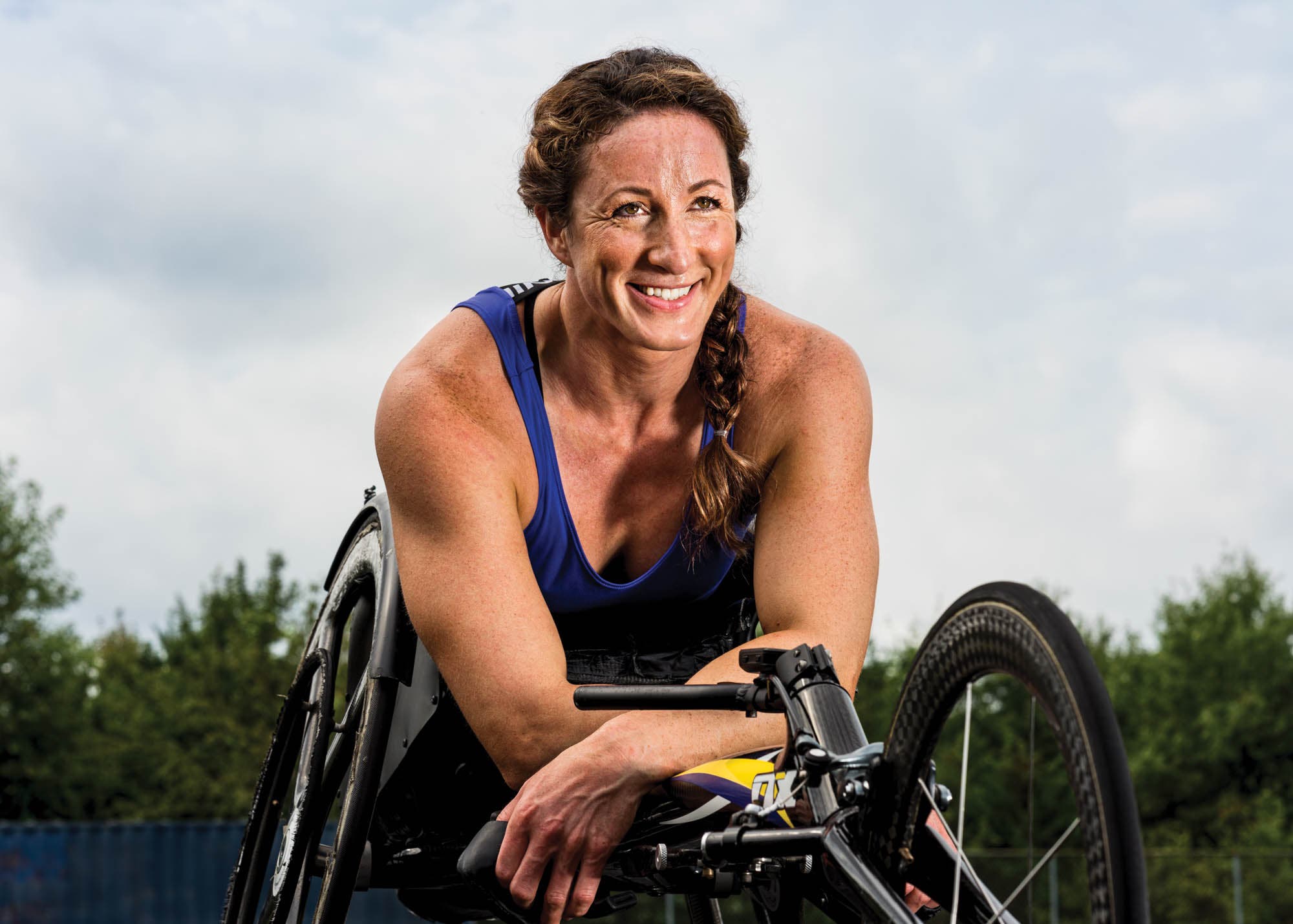 Portrait of McFadden outside in her racing wheelchair