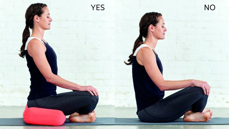 Erin Taylor shows how to correctly sit upright for meditating.