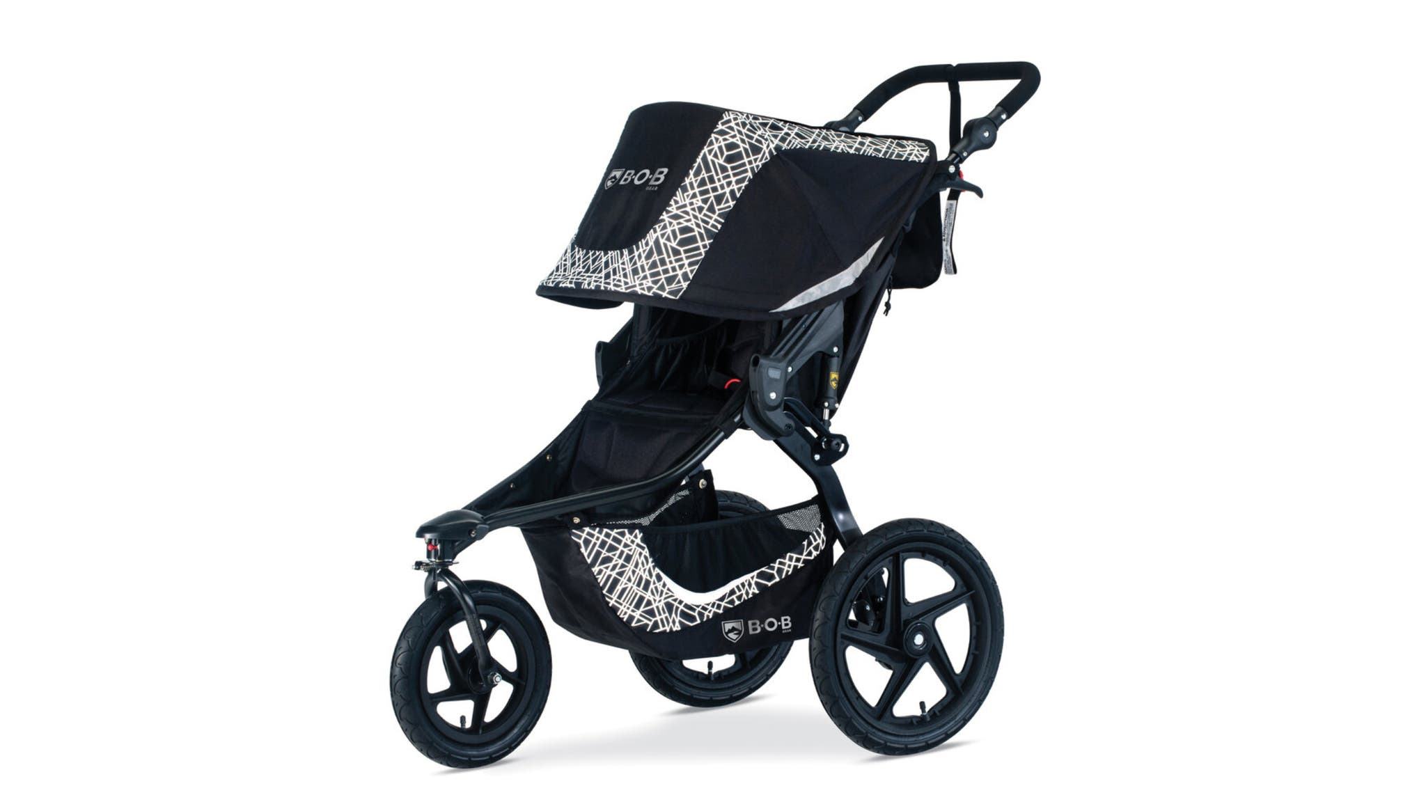 White and black patterned jogging stroller