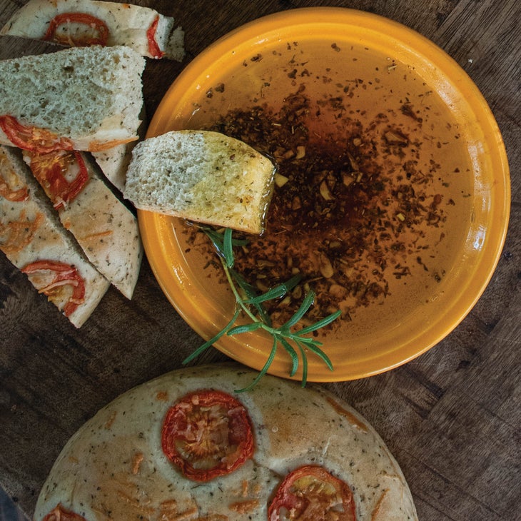Tuscan oil dip recipe with bread loaf