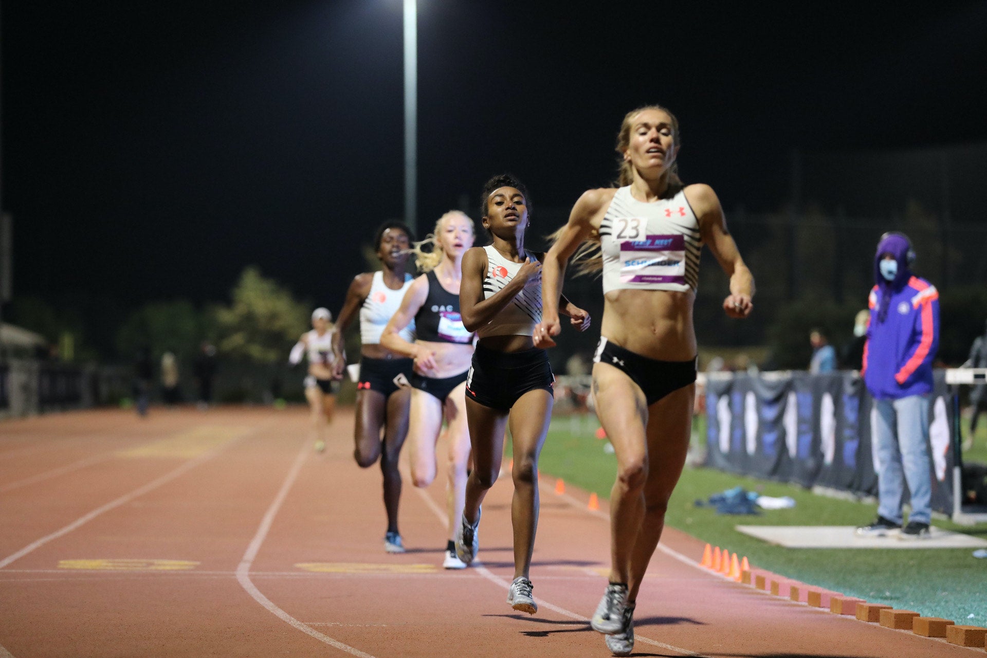 Rachel Schneider finishes first in her debut 10,000 meters on December 4 at the Track Meet.