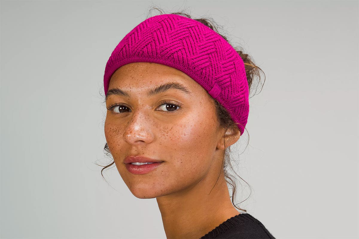 woman wearing a knit Lululemon chevron running ear warmer