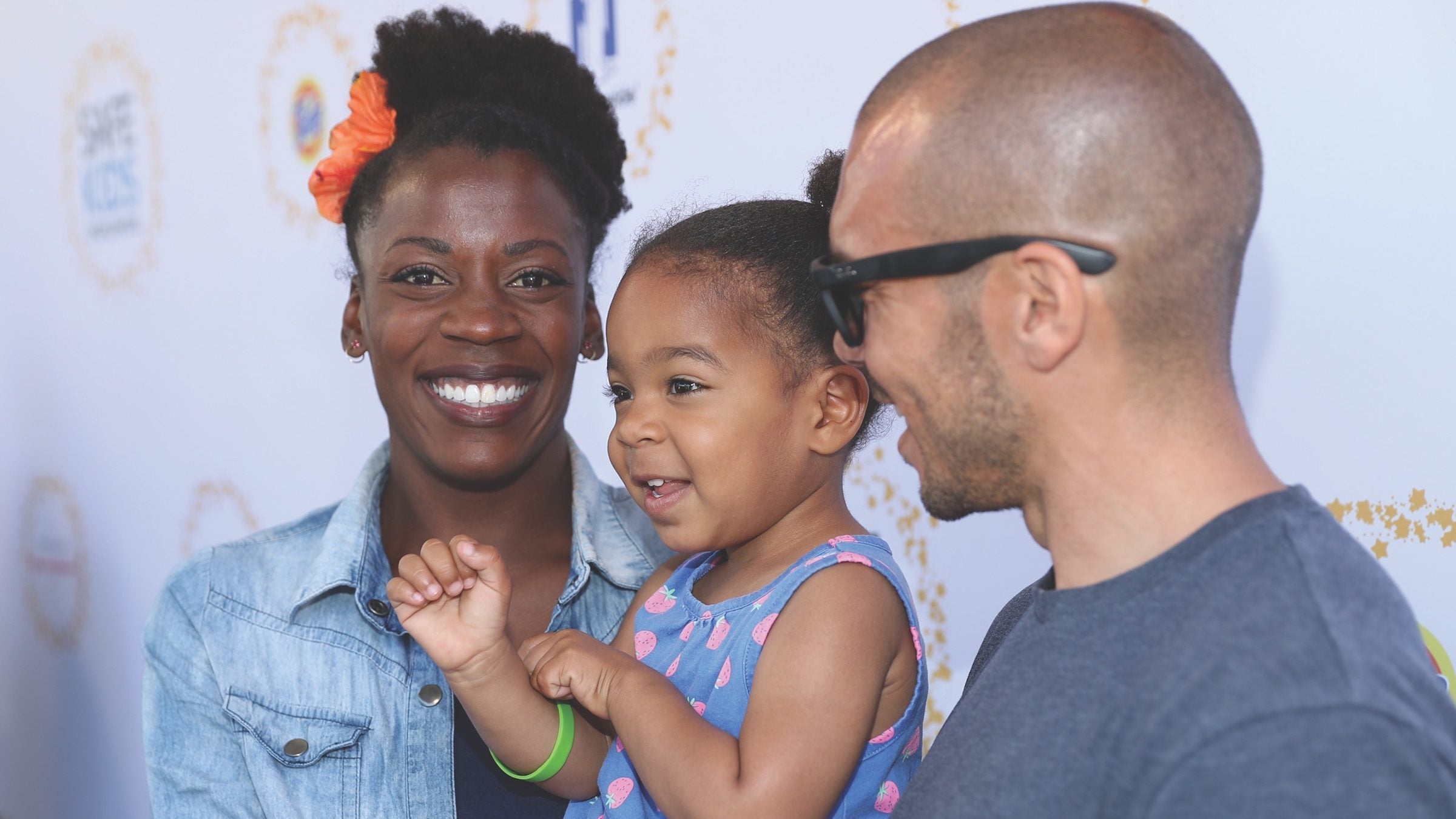 Alysia Montano poses with her daughter and husband