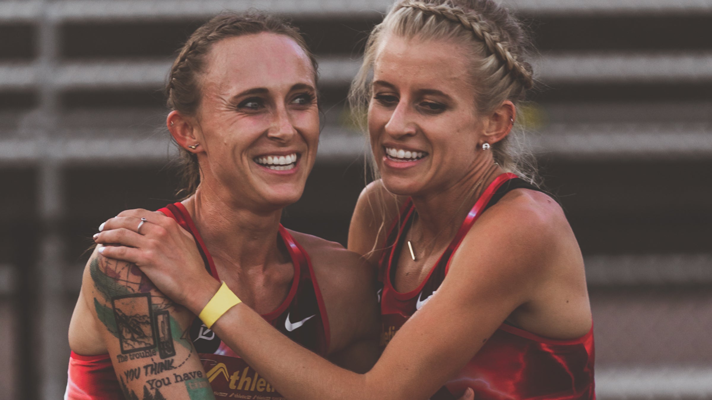 Shelby Houlihan and Karissa Schweizer hug after a race in 2020