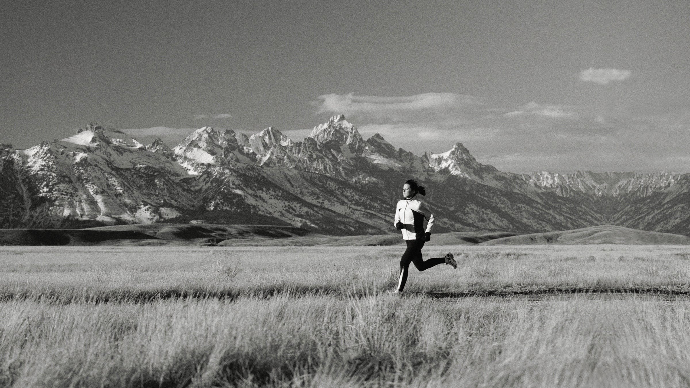 Woman running in the mountains