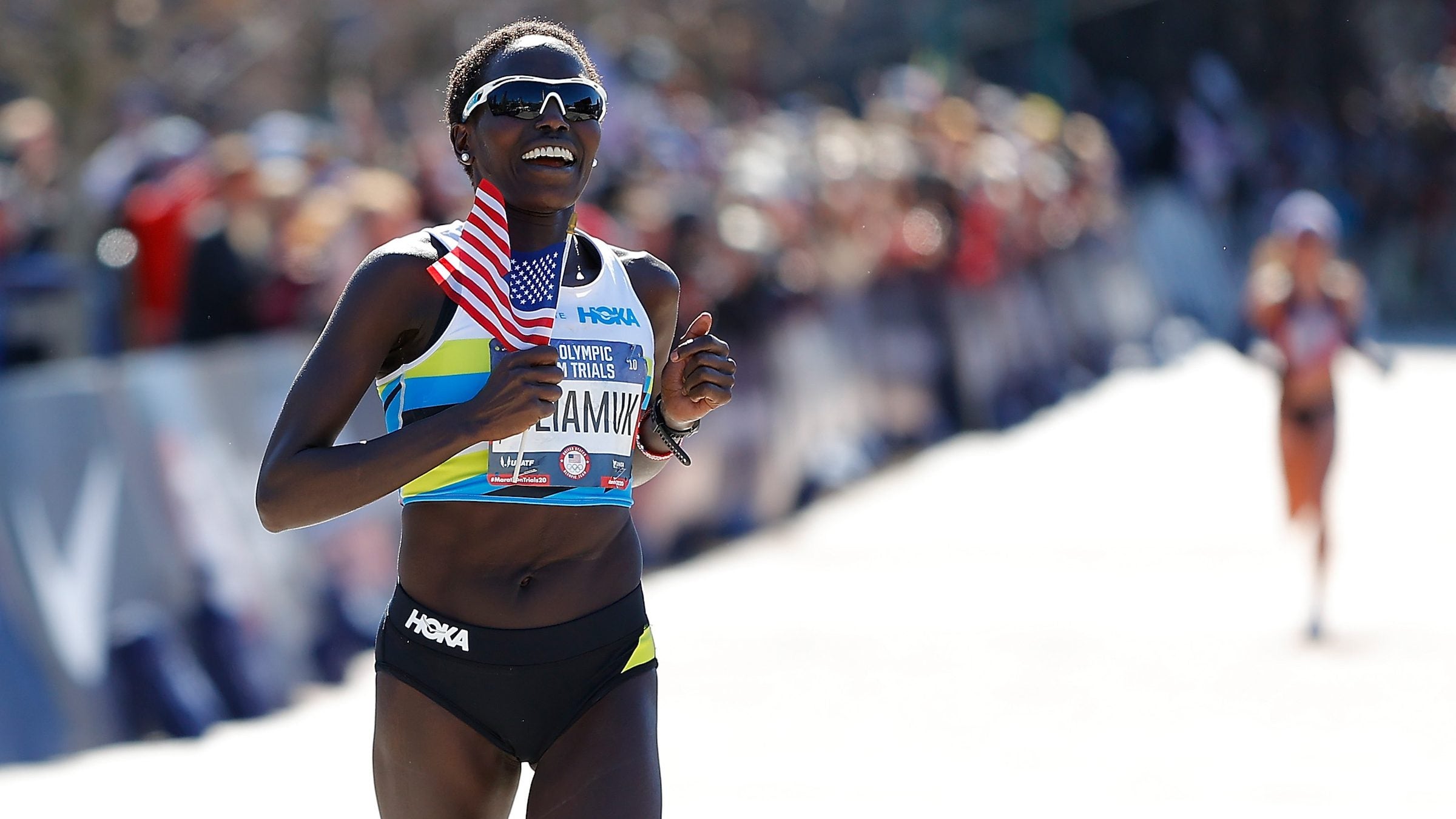 Aliphine Tuliamuk reacts as she crosses the finish line to win the Women's U.S. Olympic marathon team trials on February 29, 2020 in Atlanta, Georgia.