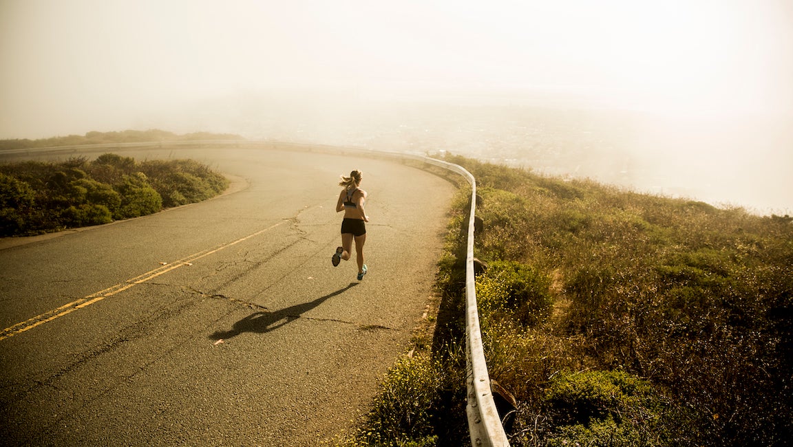 Runner running, easy because she is tapering, in San Francisco.