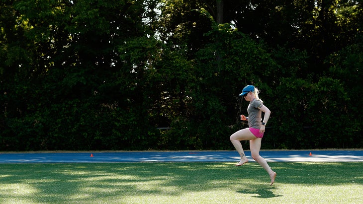 Kym Crosby practicing barefoot on grass