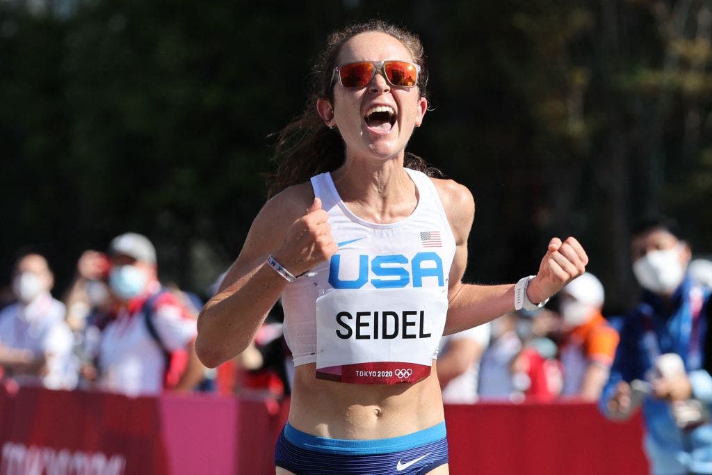 Molly Seidel crosses the finish line of the women's marathon final during the Tokyo 2020 Olympic Games in Sapporo on August 7, 2021. Next, Seidel will run the New York City Marathon.