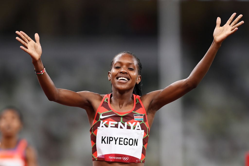 Faith Kipyegon of Team Kenya wins the gold medal during the Women's 1500 metres final on day fourteen of the Tokyo 2020 Olympic Games at Olympic Stadium on August 06, 2021 in Tokyo, Japan.