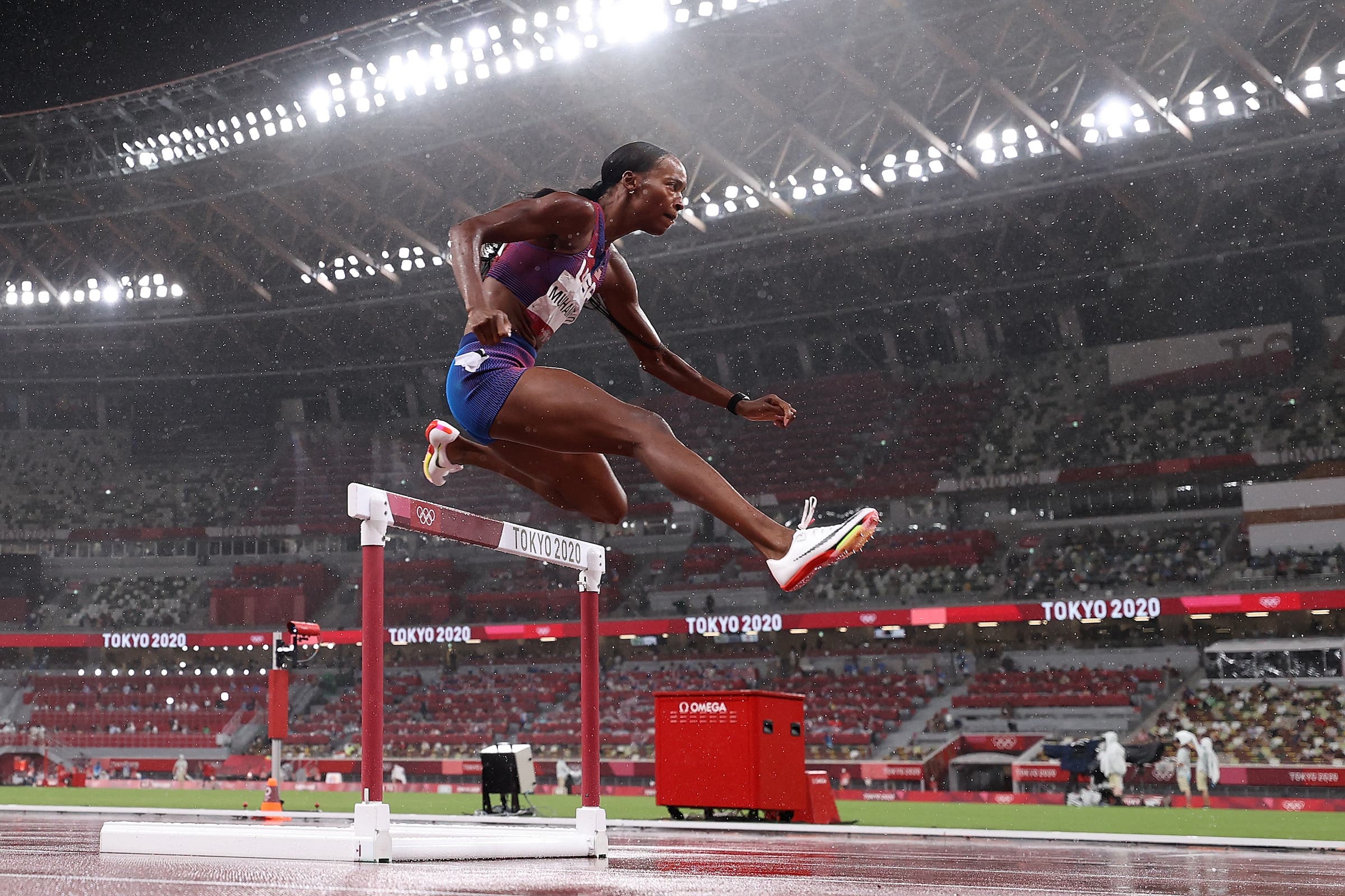 Olympics 2021: Dalilah Muhammad hurdles in the rain as she wins her heat in the women's 400m hurdles semifinal