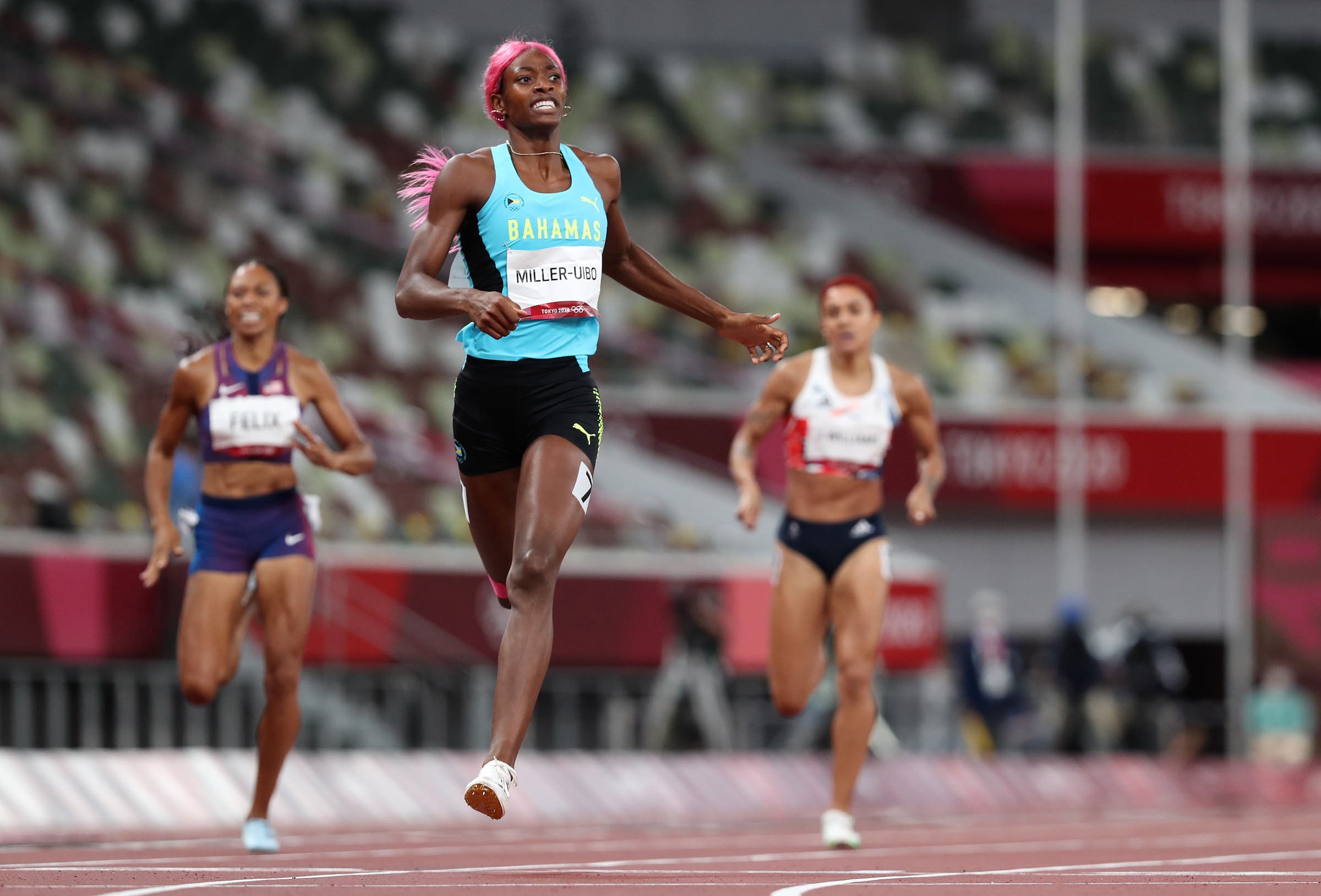 TOKYO, JAPAN - AUGUST 06: Shaunae Miller-Uibo of Team Bahamas reacts as she crosses the finish line winning the gold medal in the Women's 400m Final on day fourteen of the Tokyo 2020 Olympic Games at Olympic Stadium on August 06, 2021 in Tokyo, Japan. (Photo by Matthias Hangst/Getty Images)