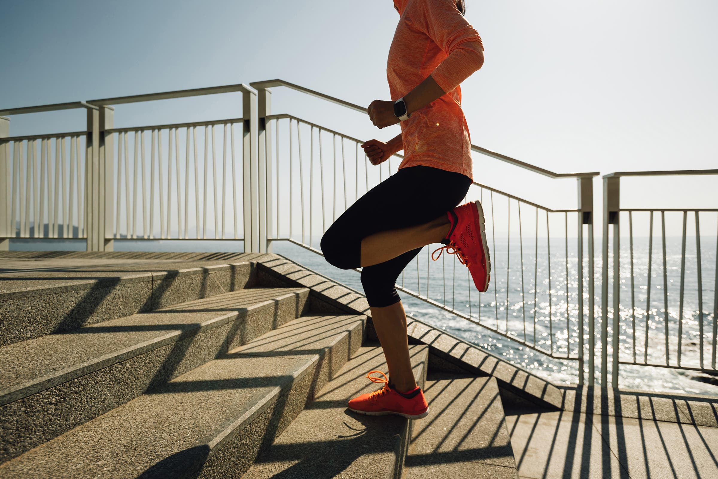 Chinese woman running stairs