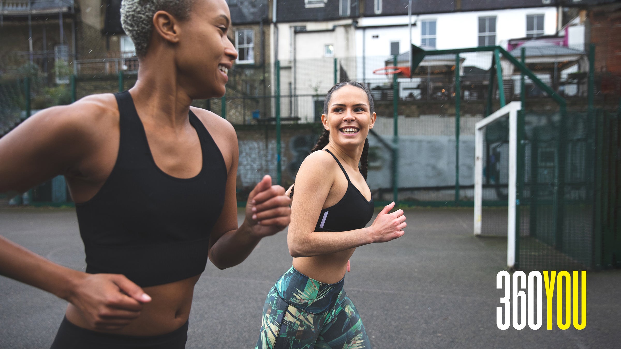 Women exercising outdoors in the city street in a rainy day in London