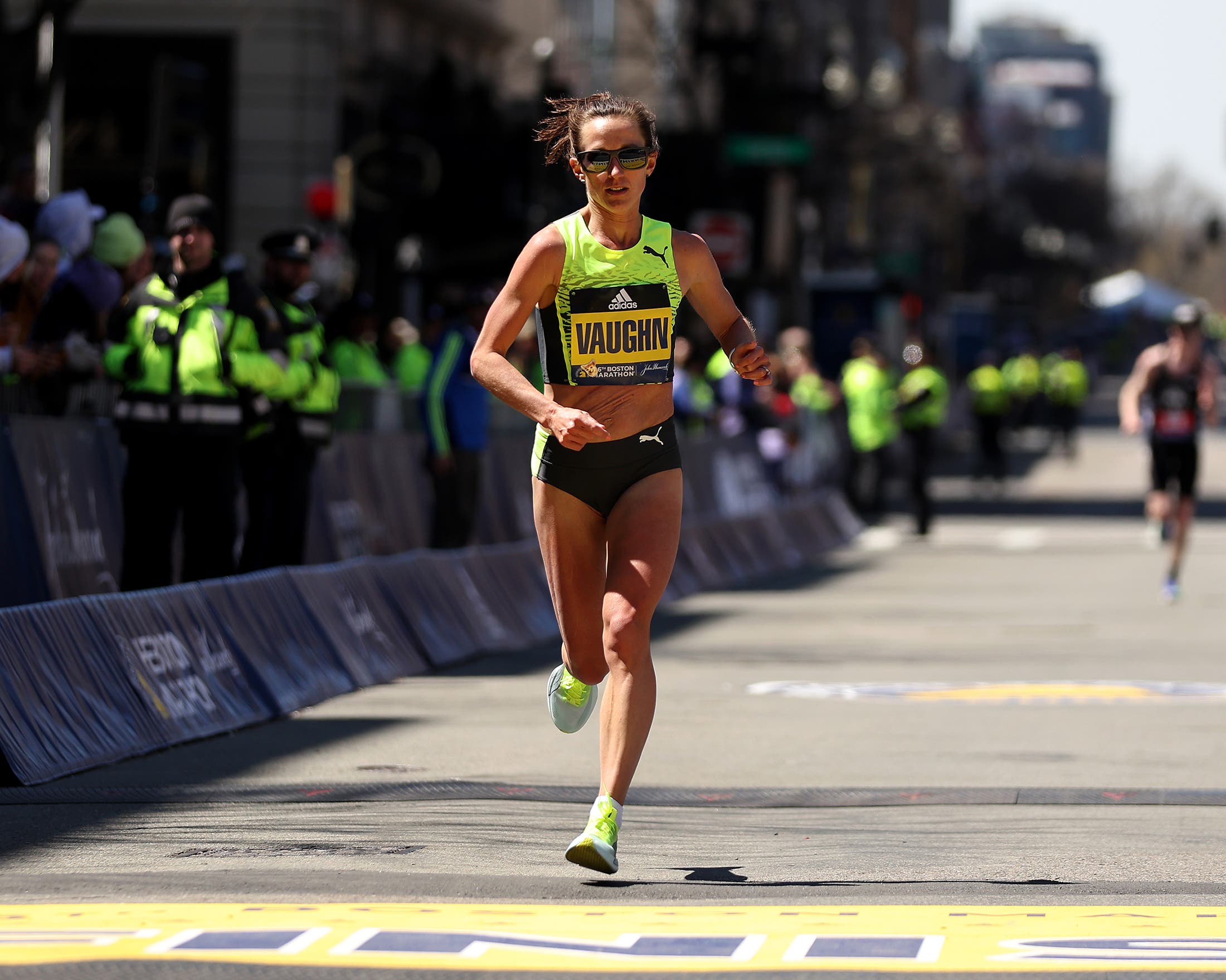 Sara Vaughn finishing the 2022 Boston Marathon