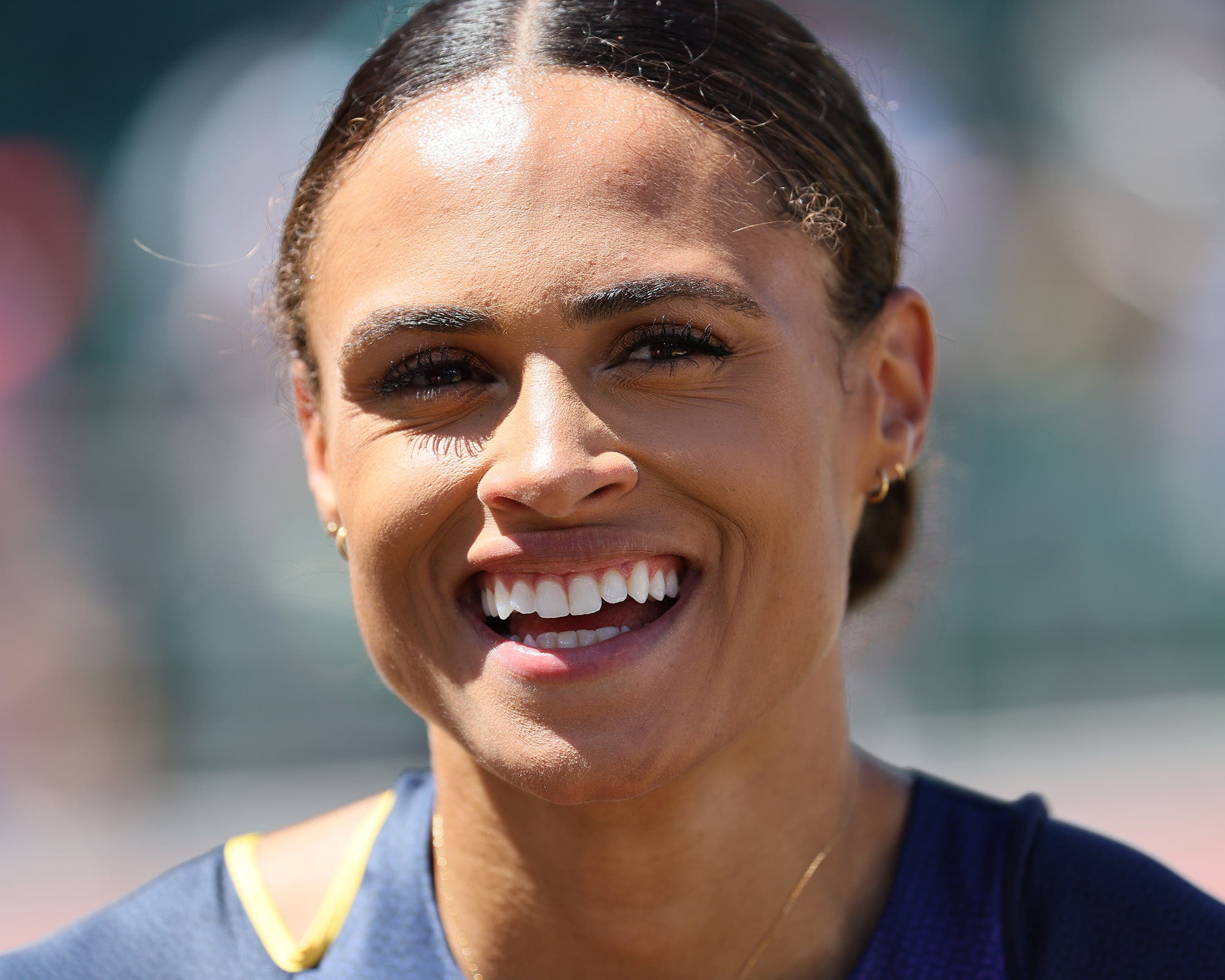 Sydney McLaughlin smiling after setting a world record