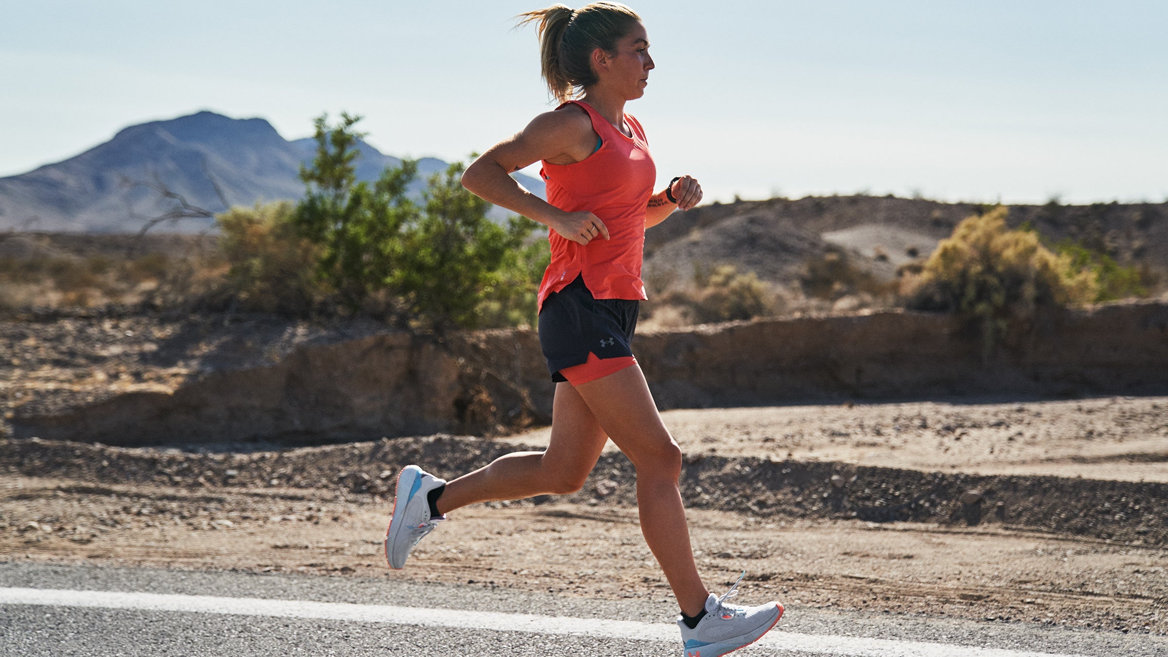 Women running in Under Armour shoes