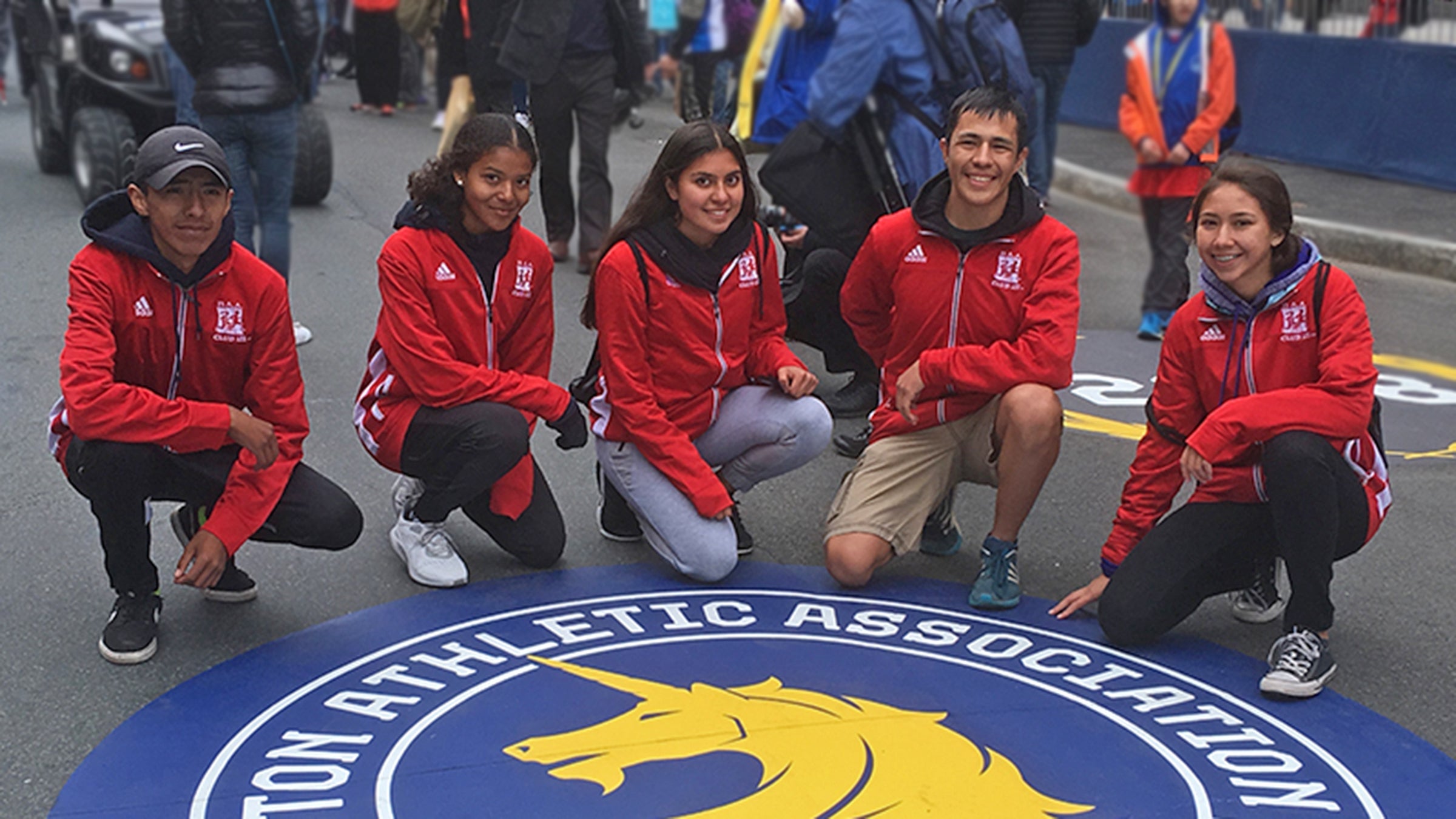 native high school runners at the Boston Marathon