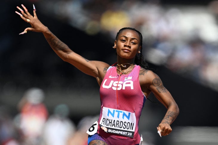 Sha'Carri Richarson salutes her win in Budapest 2023