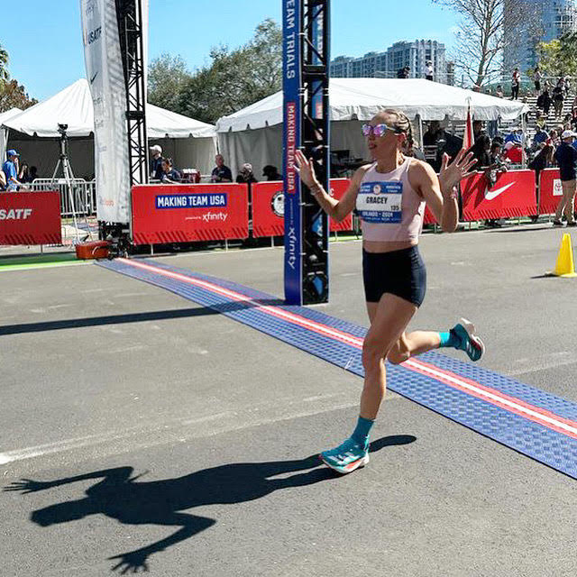 Neely Gracey crosses the finish line at the U.S. Olympic Trials marathon 